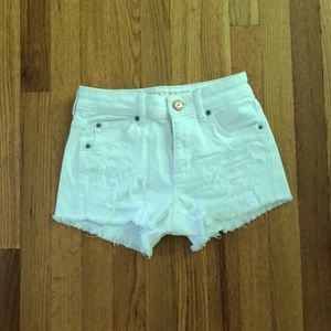 White ripped shorts!